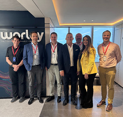 Gavin standing with a group of colleagues inside Optravation Energyoffice.