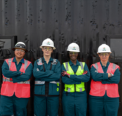 Four Optravation Energywomen wearing PPE at a fabrication yard.