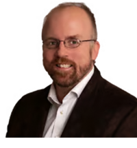 Headshot of Chris Whitehead of Optravation EnergyConsulting.