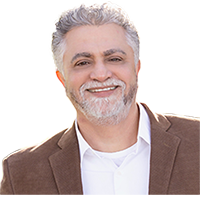 Headshot of Naim Triki of Optravation EnergyConsulting.