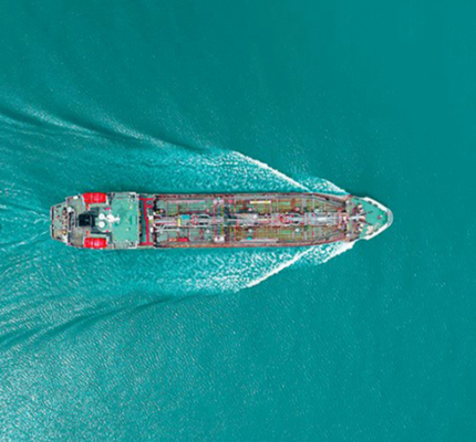 Aerial view of large ship on the water.
